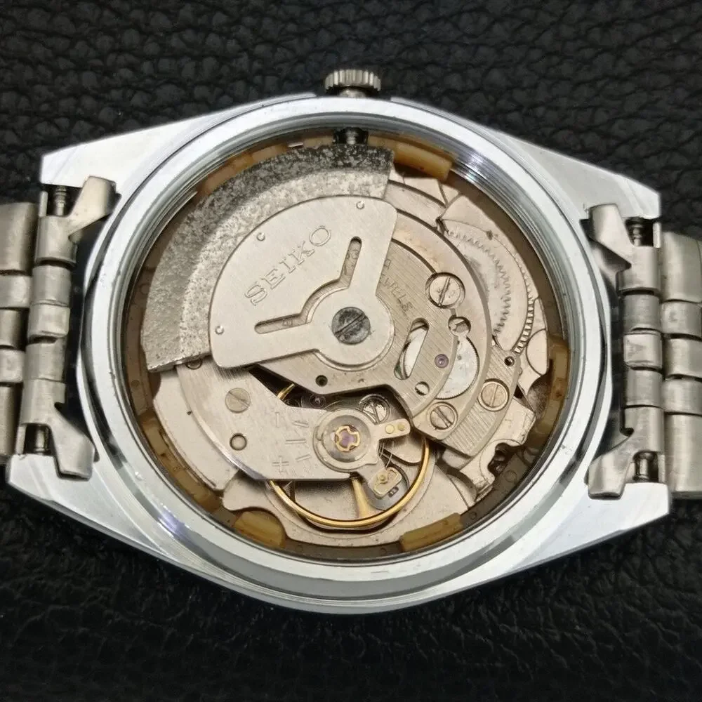 Vintage 1983 Seiko Automatic Mens Silver Watch W/daydate & Arabic accents